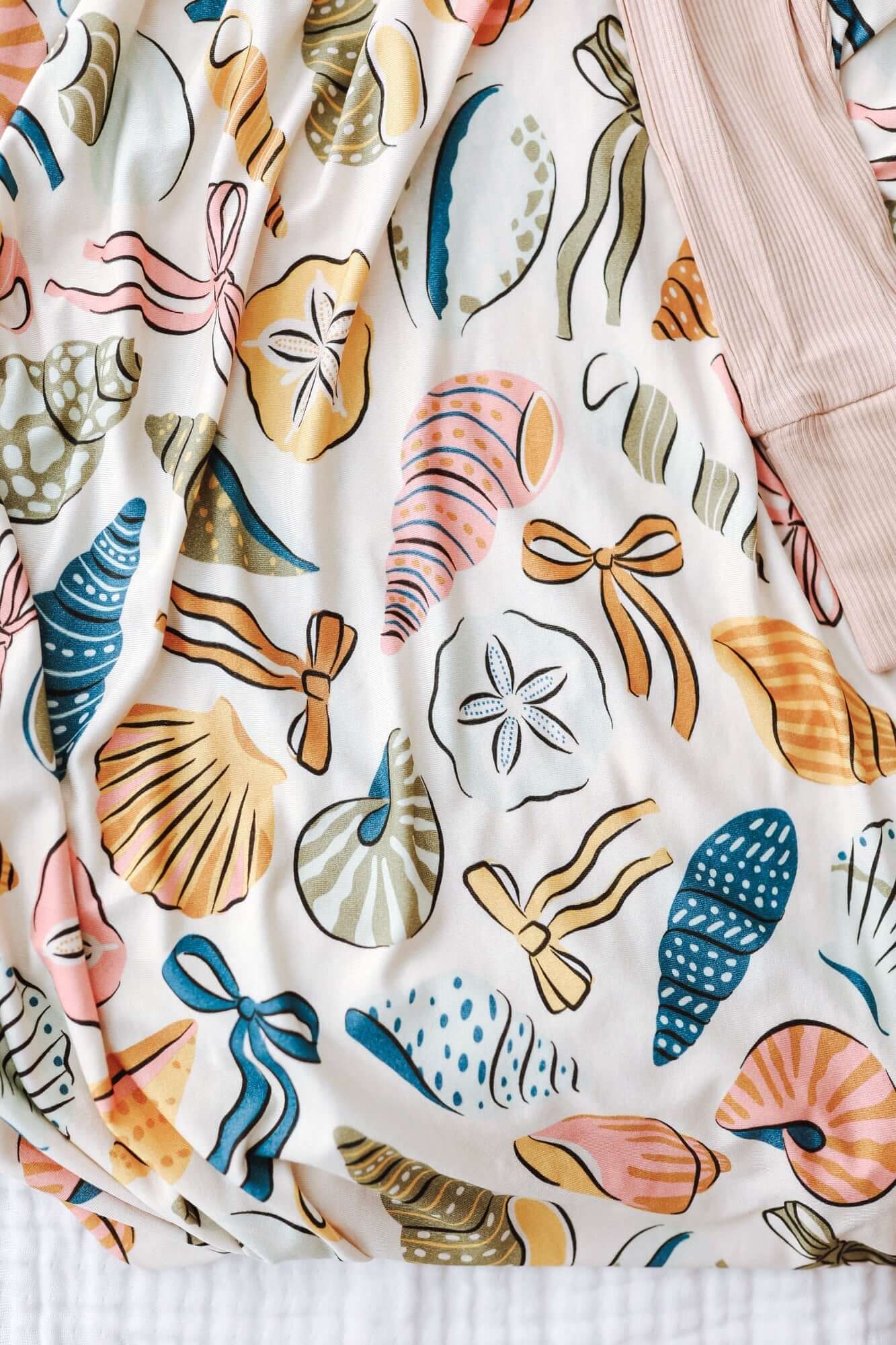 Coastal Bows Stretch Swaddle Blanket | Milk & Baby