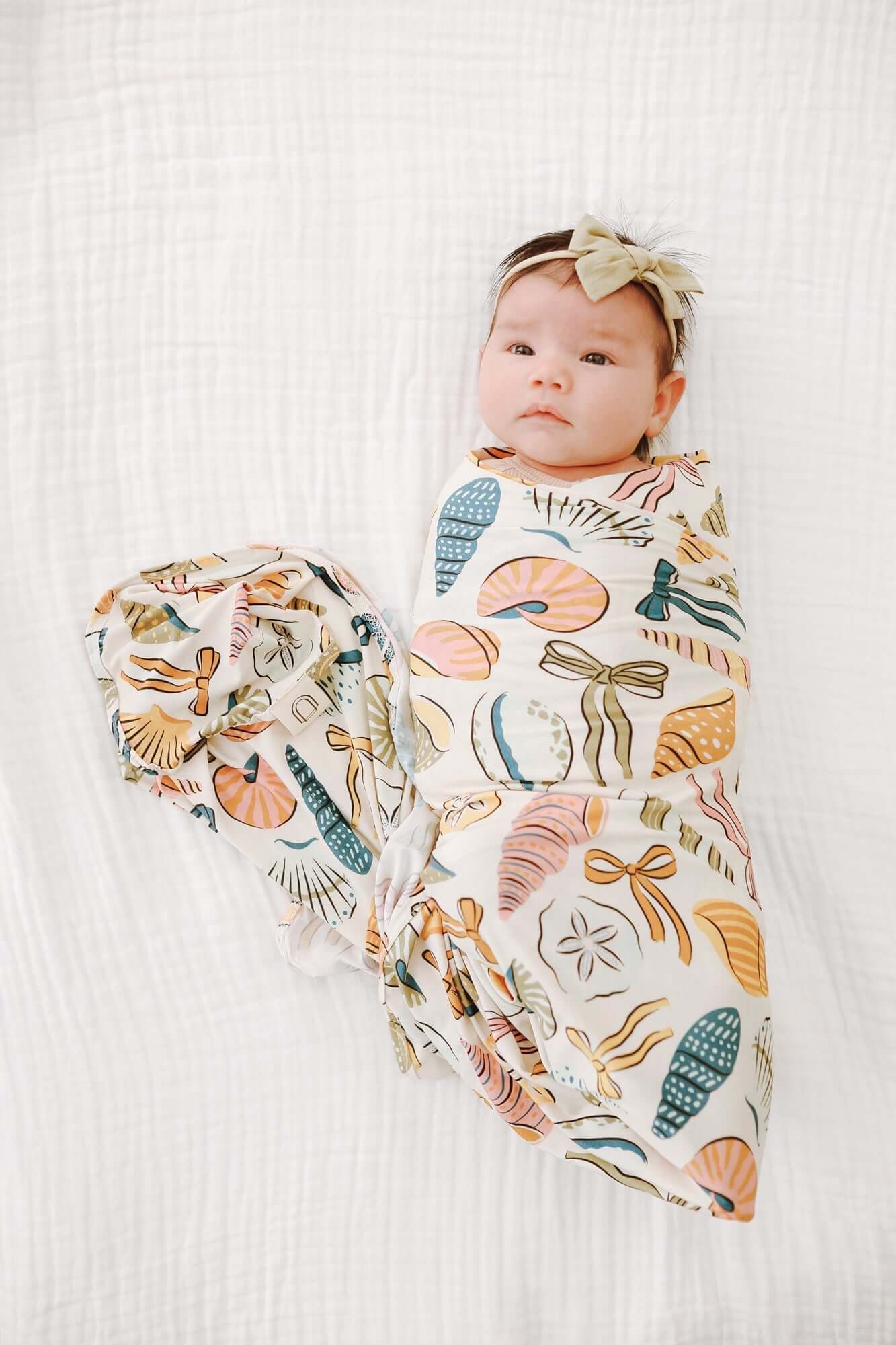 Coastal Bows Stretch Swaddle Blanket | Milk & Baby