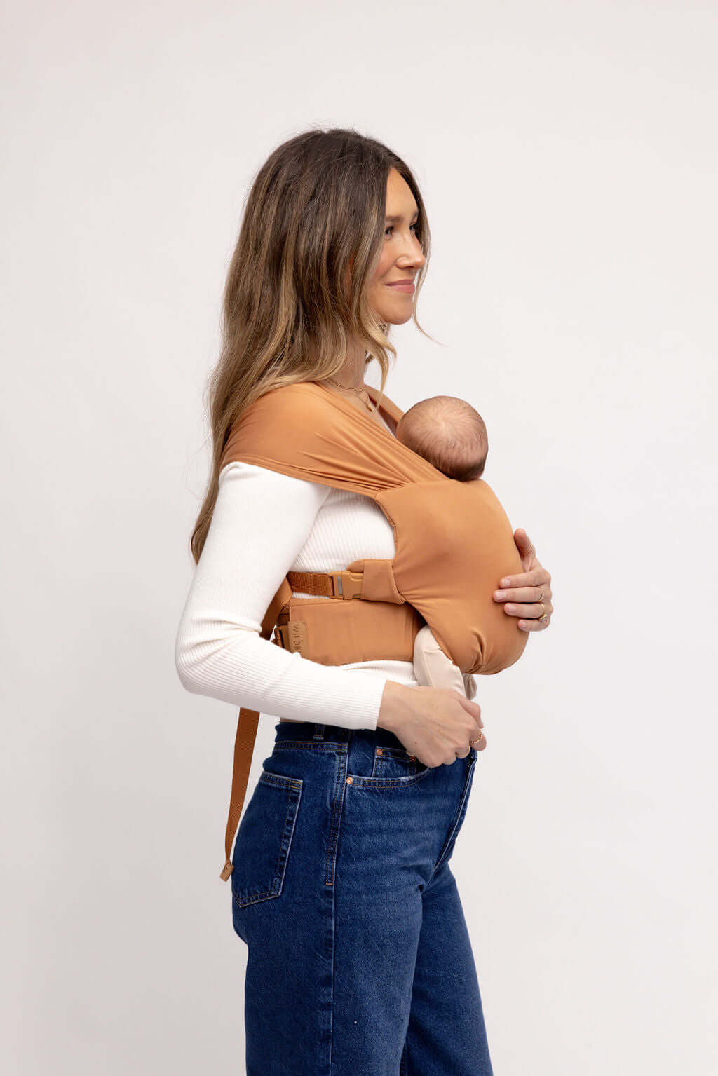 Willow | Aerial Newborn Buckle Wrap | Meet the Aerial Newborn Buckle Wrap: the perfect blend of wrap-like coziness and buckle carrier convenience for your newborn babe. Crafted from our signature CloudBlend™ fabric, it's irresistibly soft and features a p