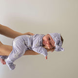 Enchanted Skelly | Bamboo Head Wrap | Discover the Bamboo Head Wrap with a stylish bow, perfect for babies and toddlers! Made from silky-soft bamboo material. | Milk & Baby