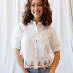 Cherry Cute Button Down blouse featuring cherry embroidery and puff sleeves, perfect for nursing friendly styles.