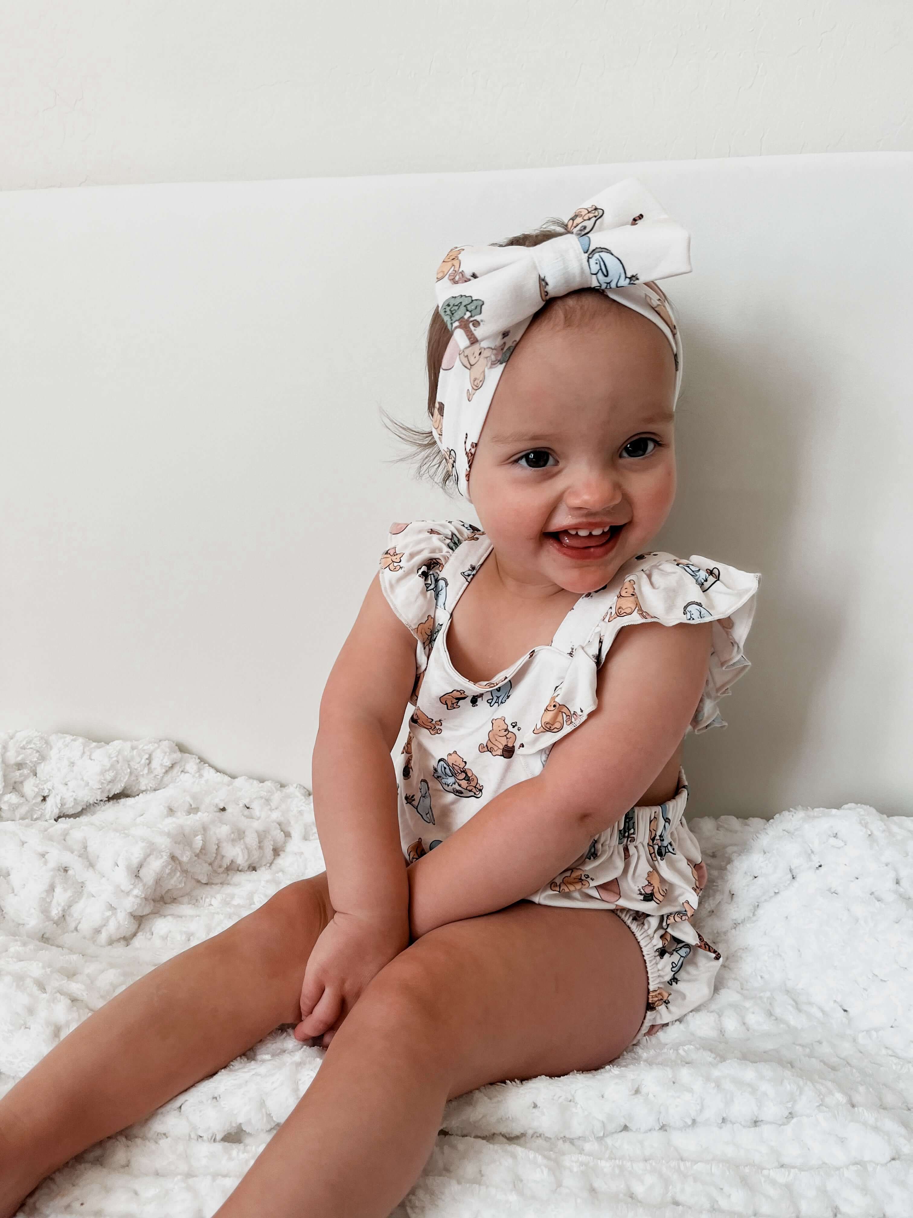 Pooh | Cross-Back Ruffle Romper | Milk & Baby