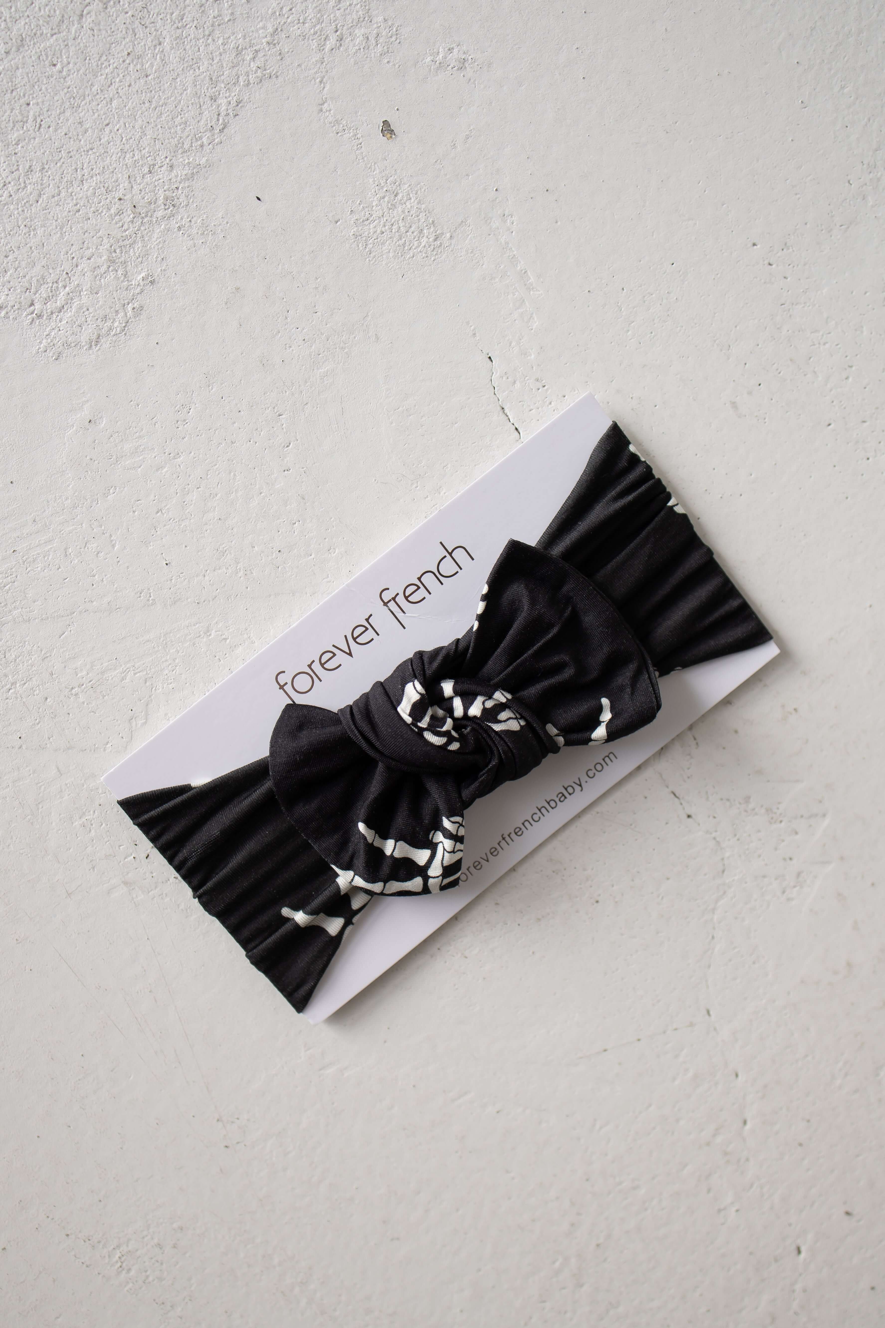 Midnight Skelly | Bamboo Head Wrap | Discover the Bamboo Head Wrap, crafted from silky-soft bamboo, perfect for babies and toddlers! Stylish and comfy for every occasion! | Milk & Baby