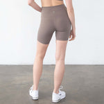 Reveal Ultra High-Rise Postpartum Compression Biker Short 7'' (NOMAD) | Milk & Baby