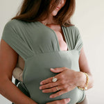 Acadian | Aerial Newborn Buckle Wrap | Meet the Aerial Newborn Buckle Wrap: the perfect blend of wrap-like coziness and buckle carrier convenience for your newborn babe. Crafted from our signature CloudBlend™ fabric, it's irresistibly soft and features a