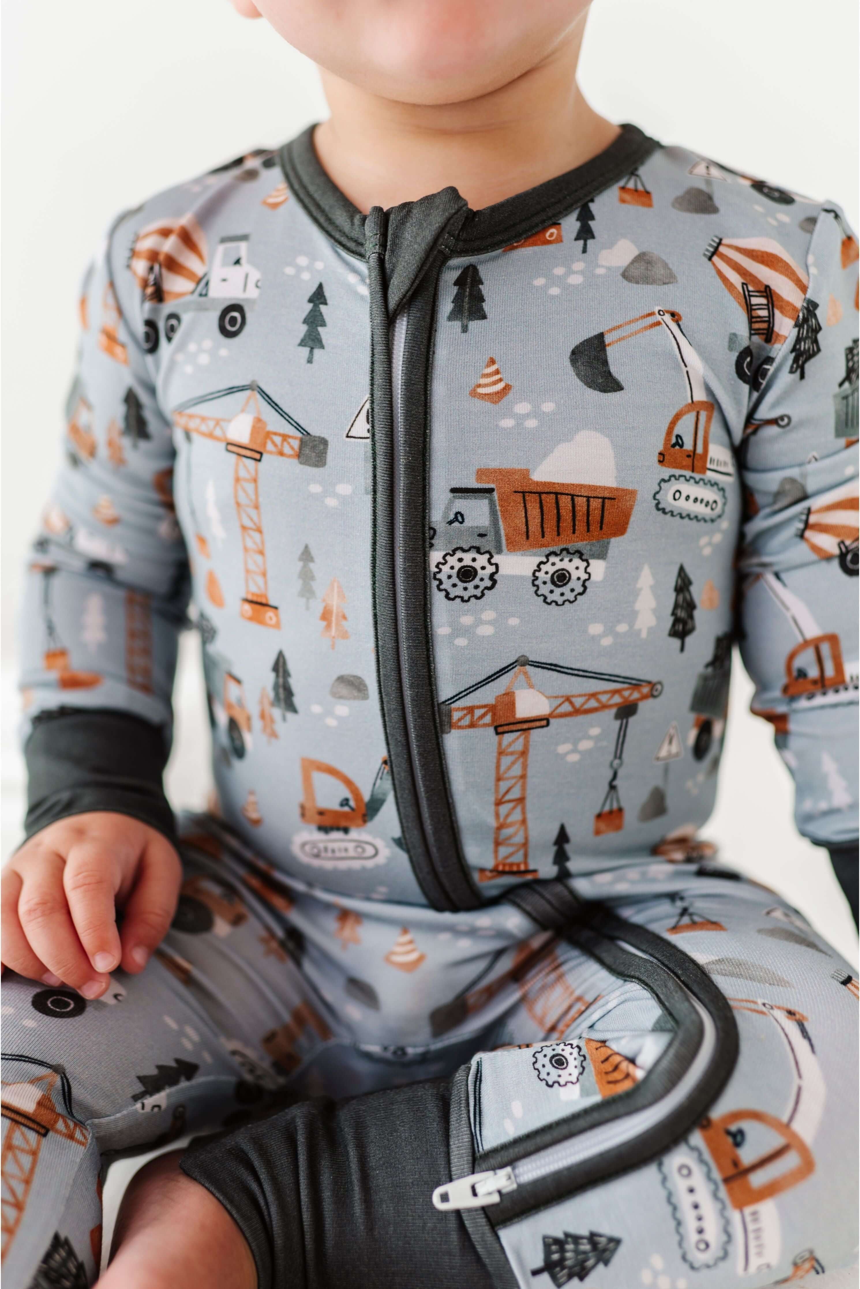 Mason | Bamboo One Piece Zip Pajama | . Mason Bamboo Convertible Romper Build a foundation for cozy comfort with our Mason Bamboo Convertible Romper! Made from luxuriously soft bamboo fabric, this romper is perfect for your little builder's downtime. The