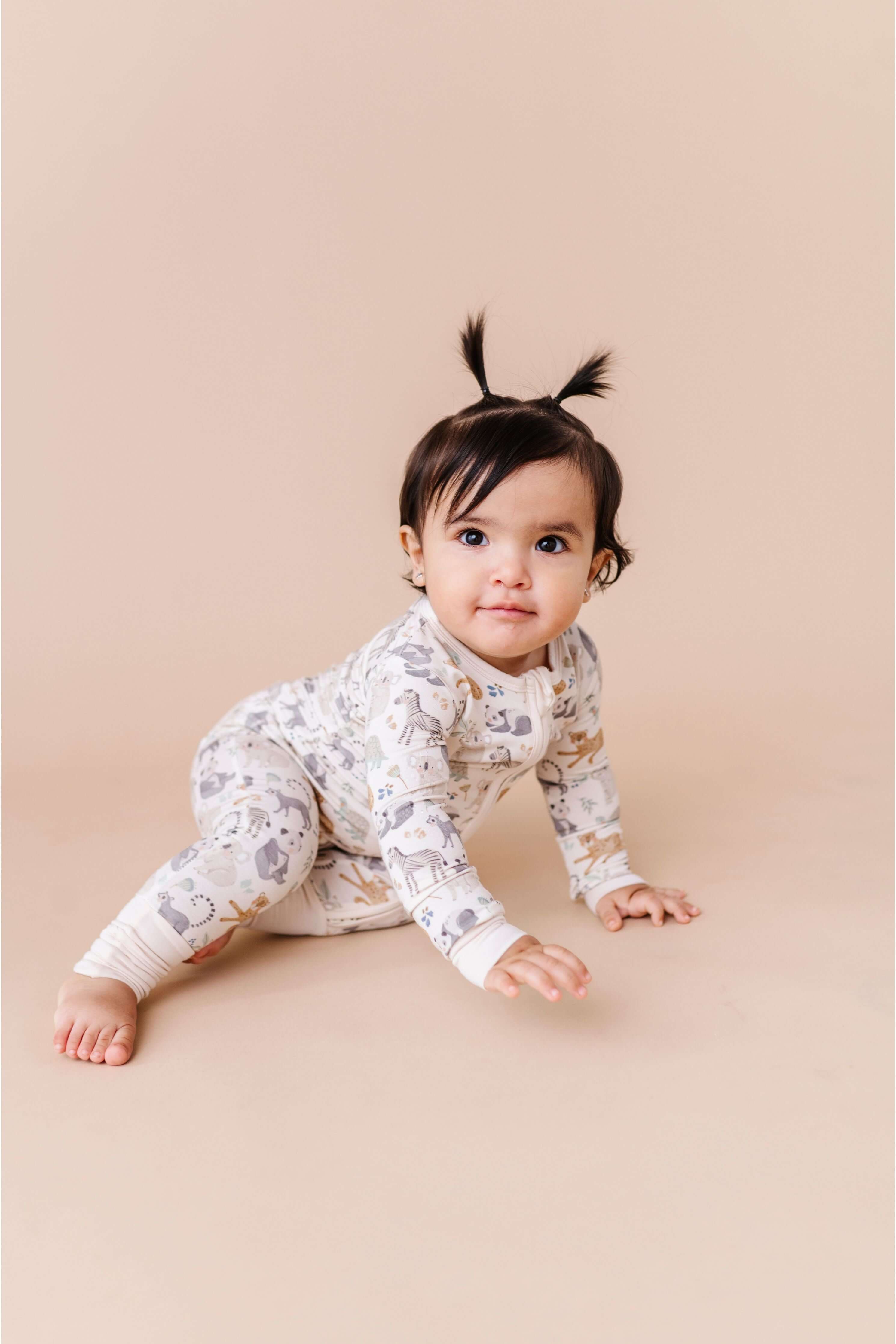 Safari Friends | Bamboo One Piece Zip Pajama | Bamboo Zip Romper – Safari Friends Animal Print Baby One-Piece An ultra-soft bamboo zip romper with an adorable safari animal print, designed for comfort, breathability, and effortless diaper changes. Key Fea