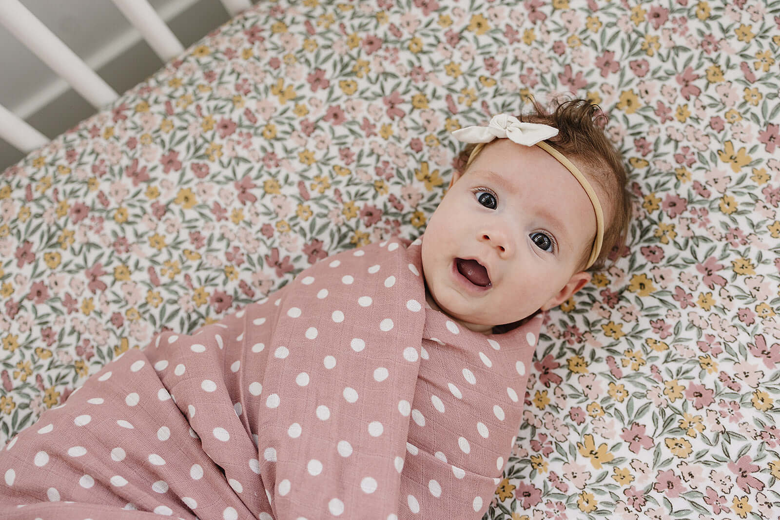 Sunny Petals Muslin Crib Sheet | Transform your baby's crib into a cozy haven with our Sunny Petals Muslin Crib Sheet. Crafted from our exclusive soft and breathable muslin fabric, this sheet showcases a neutral design that adds a touch of warmth and styl
