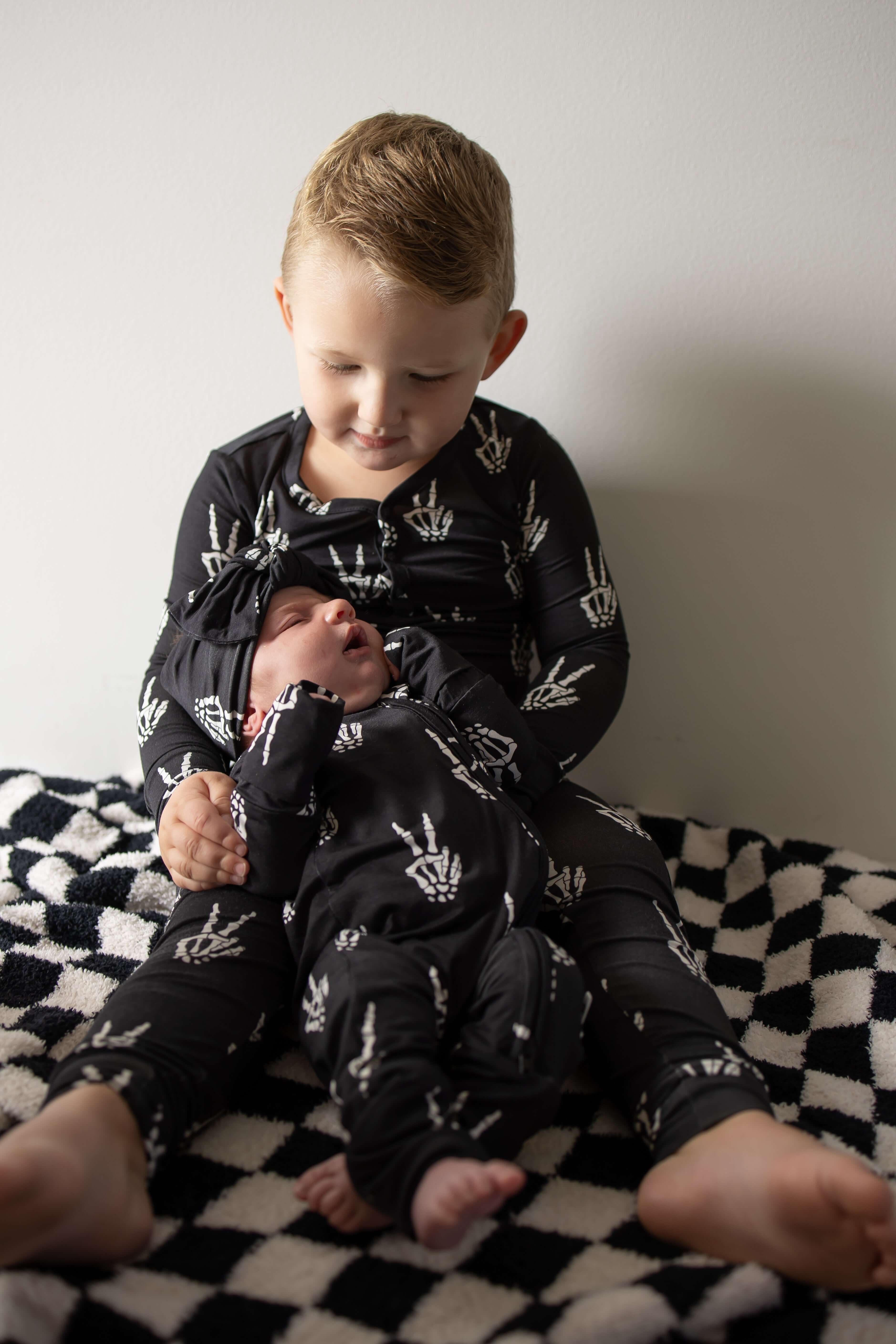 Midnight Skelly | Bamboo Zip Pajamas | Snuggle up in our Bamboo Zip Pajamas, crafted from premium bamboo for ultimate comfort. Perfect for cozy sleep and playful adventures! | Milk & Baby