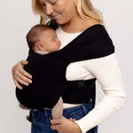 Raven | Aerial Newborn Buckle Wrap | Meet the Aerial Newborn Buckle Wrap: the perfect blend of wrap-like coziness and buckle carrier convenience for your newborn babe. Crafted from our signature CloudBlend™ fabric, it's irresistibly soft and features a pa