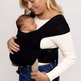 Raven | Aerial Newborn Buckle Wrap | Meet the Aerial Newborn Buckle Wrap: the perfect blend of wrap-like coziness and buckle carrier convenience for your newborn babe. Crafted from our signature CloudBlend™ fabric, it's irresistibly soft and features a pa