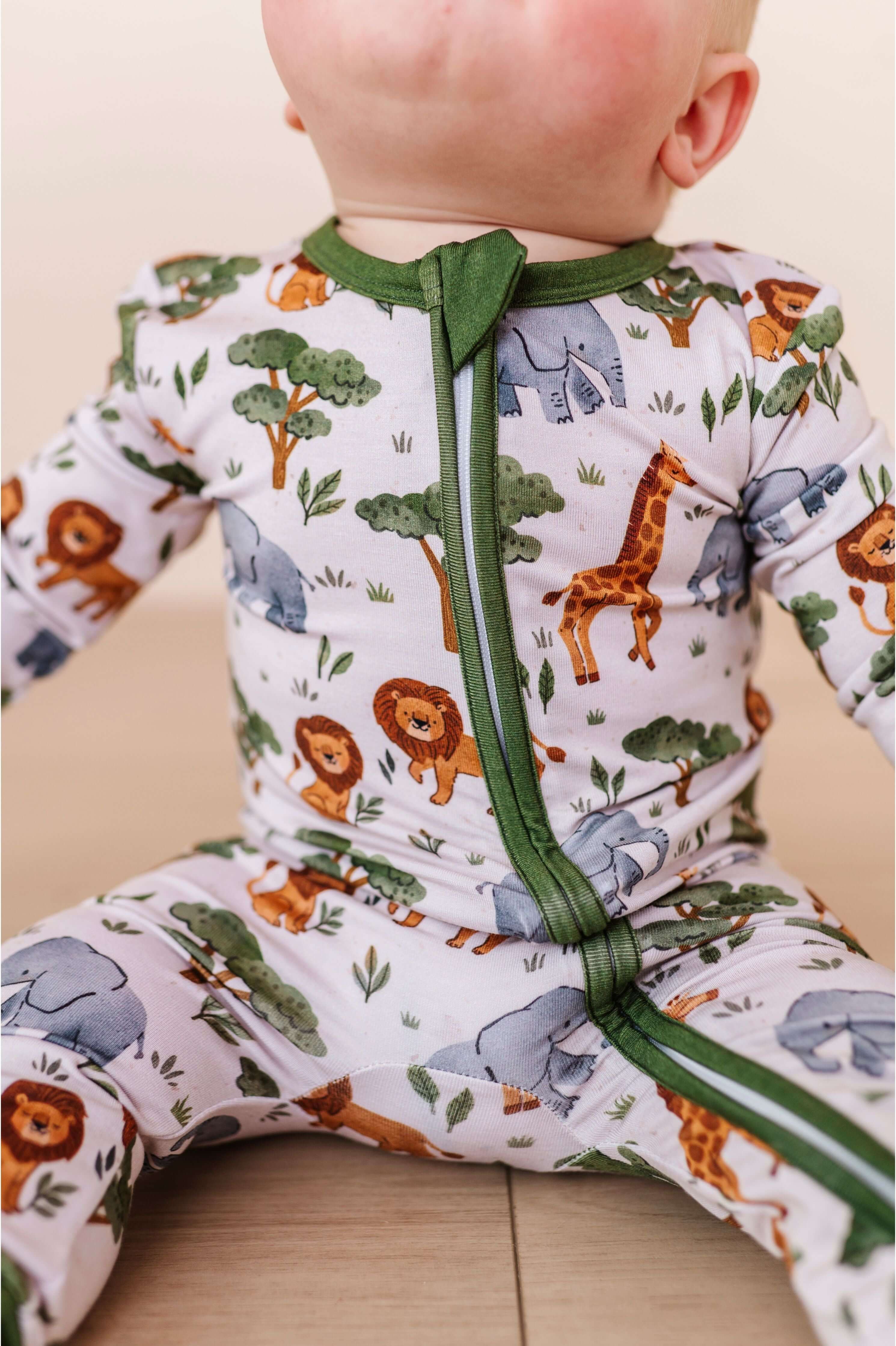 It's a Jungle Out There | Bamboo One Piece Zip Pajama | WHY BIRD & BEAN?Bird & Bean creates premium bamboo pajamas designed for comfort and durability. Made from the highest quality, extra soft bamboo viscose fabric, these baby and kid's pajamas feature a