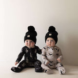 Midnight Skelly | Bamboo Zip Pajamas | Snuggle up in our Bamboo Zip Pajamas, crafted from premium bamboo for ultimate comfort. Perfect for cozy sleep and playful adventures! | Milk & Baby