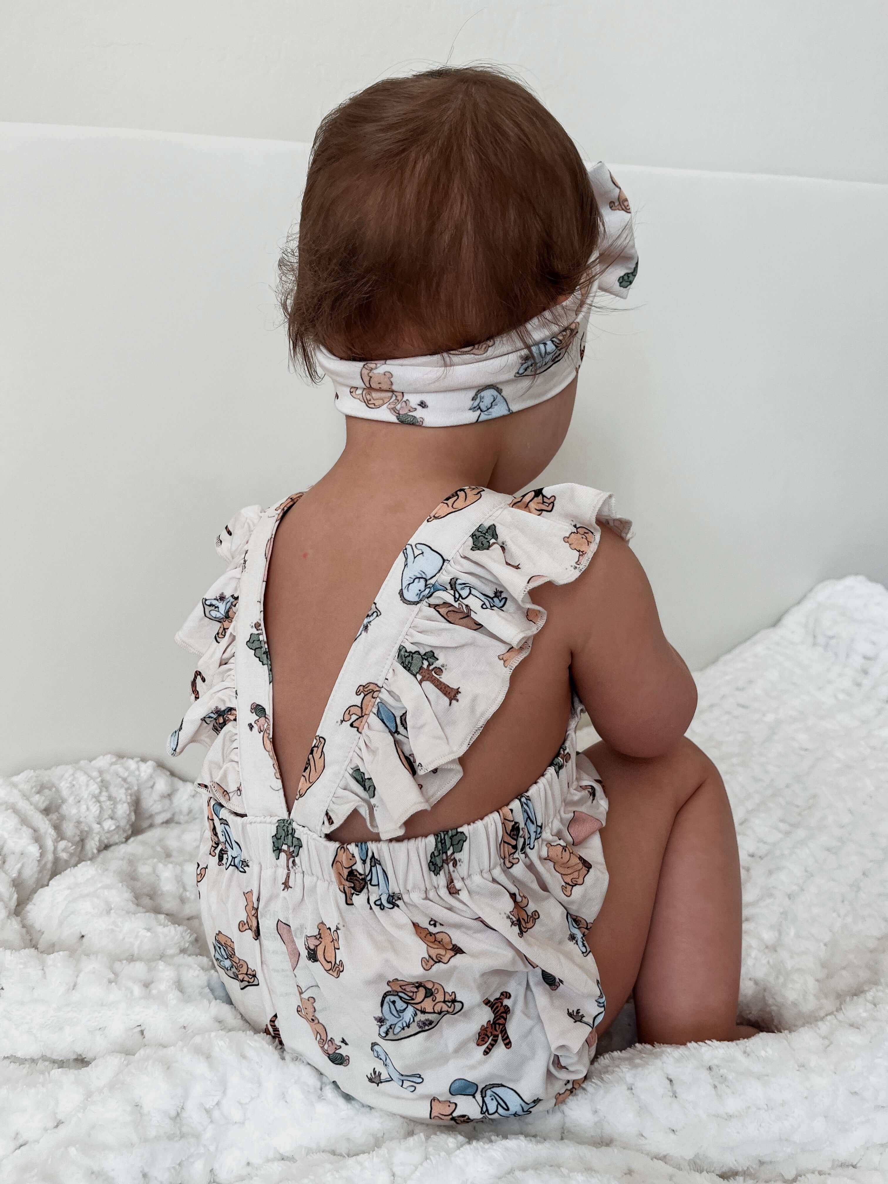 Pooh | Cross-Back Ruffle Romper | Milk & Baby