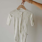 Bamboo Zip Pajamas | Palm | Milk & Baby | Made of the softest premium bamboo. Durable and well designed your little ones can sleep and play in these cozy pajamas. Our smallest sizes have rollover cuffs on the hands and all of the one piece sizes have cuff