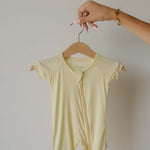 Sunny | Shortie Bamboo Zip | Milk & Baby | Made of the softest premium bamboo. Durable and well designed your little ones can sleep and play in these cozy pajamas. These shortie rompers are ideal for warmer months featuring short sleeves and short bottoms