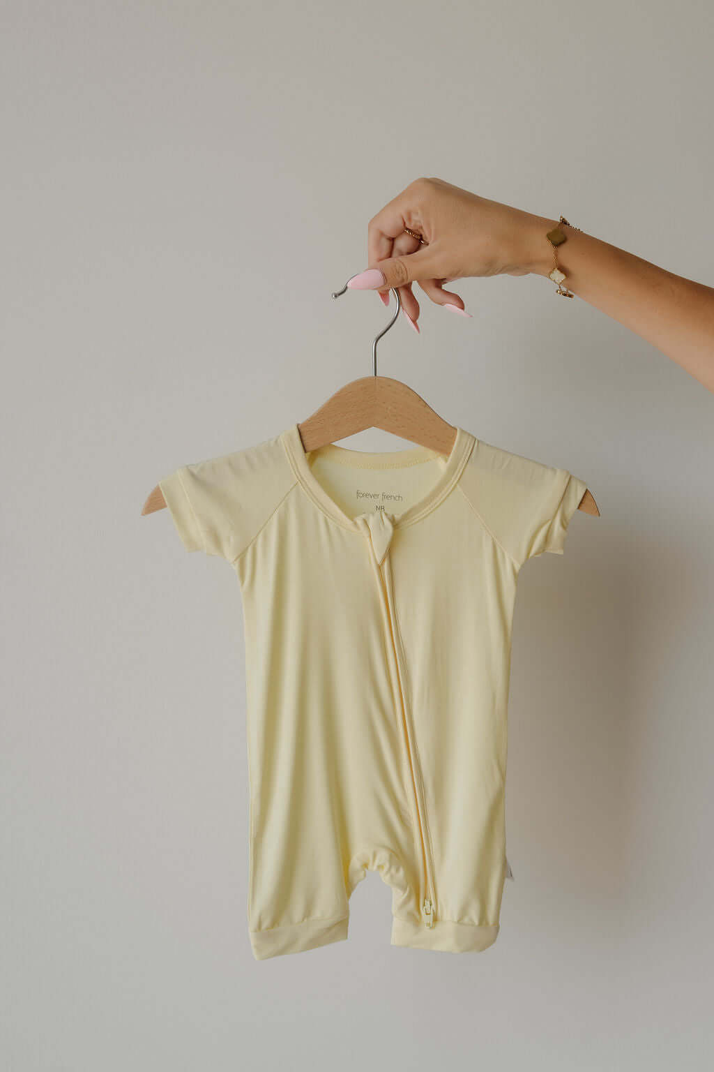 Sunny | Shortie Bamboo Zip | Milk & Baby | Made of the softest premium bamboo. Durable and well designed your little ones can sleep and play in these cozy pajamas. These shortie rompers are ideal for warmer months featuring short sleeves and short bottoms