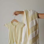 Sunny | Shortie Bamboo Zip | Milk & Baby | Made of the softest premium bamboo. Durable and well designed your little ones can sleep and play in these cozy pajamas. These shortie rompers are ideal for warmer months featuring short sleeves and short bottoms