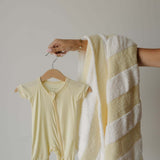 Sunny | Shortie Bamboo Zip | Milk & Baby | Made of the softest premium bamboo. Durable and well designed your little ones can sleep and play in these cozy pajamas. These shortie rompers are ideal for warmer months featuring short sleeves and short bottoms