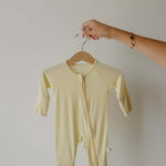 Sunny | Bamboo Zip Pajamas | Milk & Baby | Made of the softest premium bamboo. Durable and well designed your little ones can sleep and play in these cozy pajamas. Our smallest sizes have rollover cuffs on the hands and all of the one piece sizes have cuf