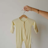 Sunny | Bamboo Zip Pajamas | Milk & Baby | Made of the softest premium bamboo. Durable and well designed your little ones can sleep and play in these cozy pajamas. Our smallest sizes have rollover cuffs on the hands and all of the one piece sizes have cuf