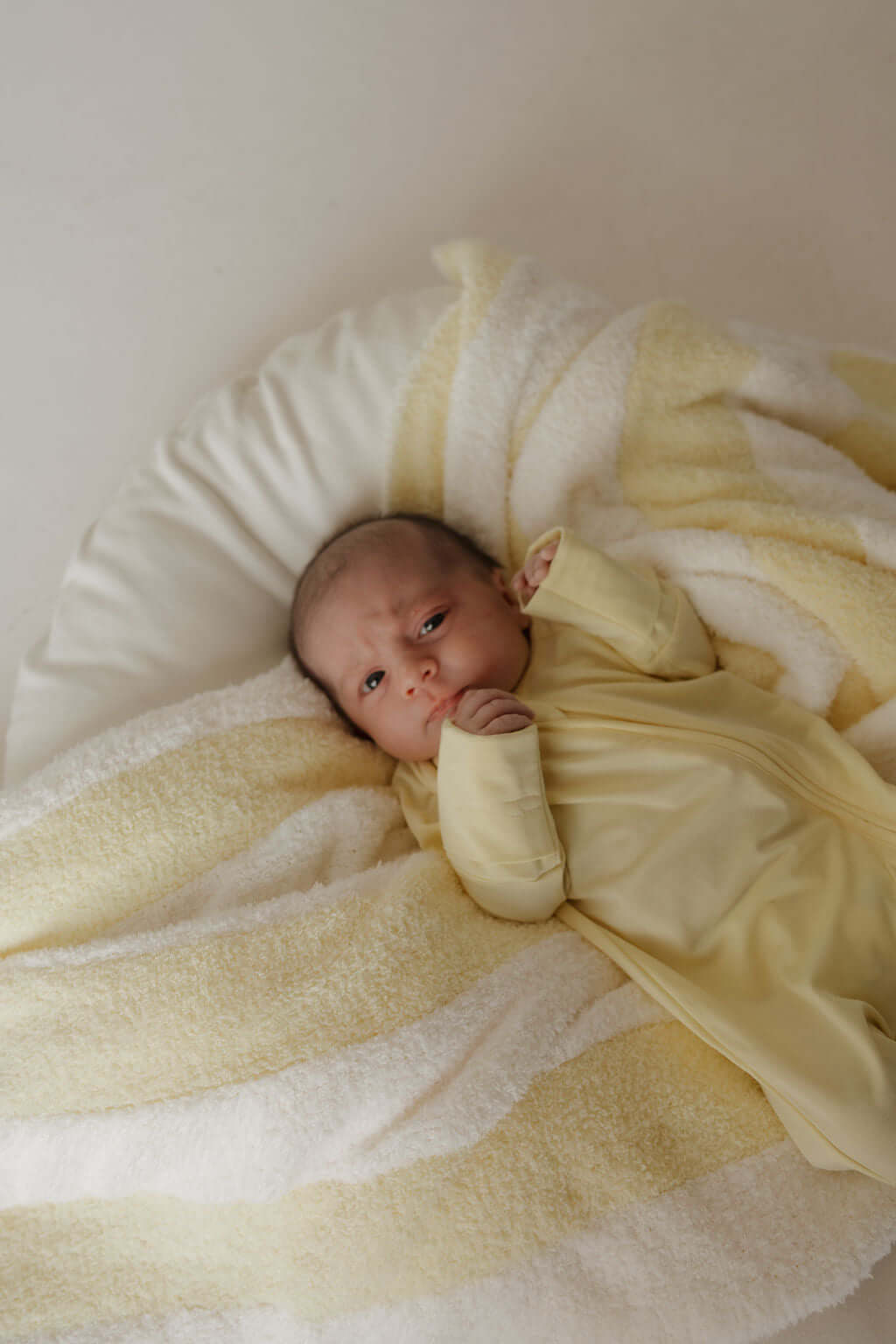 Sunny | Bamboo Zip Pajamas | Milk & Baby | Made of the softest premium bamboo. Durable and well designed your little ones can sleep and play in these cozy pajamas. Our smallest sizes have rollover cuffs on the hands and all of the one piece sizes have cuf