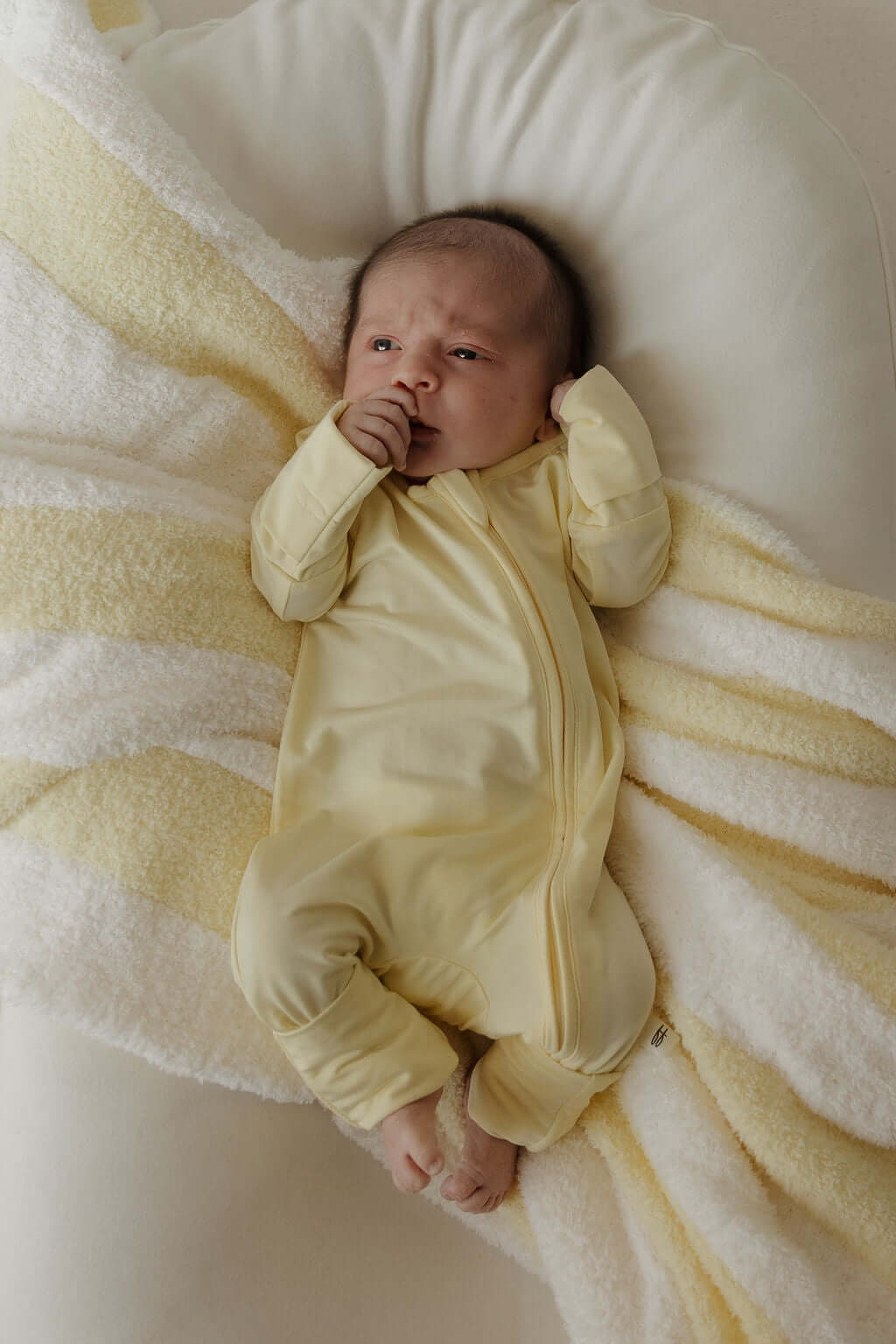 Sunny | Bamboo Zip Pajamas | Milk & Baby | Made of the softest premium bamboo. Durable and well designed your little ones can sleep and play in these cozy pajamas. Our smallest sizes have rollover cuffs on the hands and all of the one piece sizes have cuf