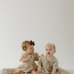Silly Goose | Ruffle Muslin Romper | Milk & Baby