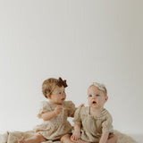 Silly Goose | Ruffle Muslin Romper | Milk & Baby