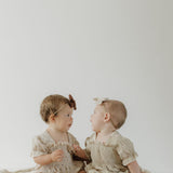Silly Goose | Ruffle Muslin Romper | Milk & Baby