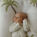 Bamboo Zip Pajamas | Palm | Milk & Baby | Made of the softest premium bamboo. Durable and well designed your little ones can sleep and play in these cozy pajamas. Our smallest sizes have rollover cuffs on the hands and all of the one piece sizes have cuff