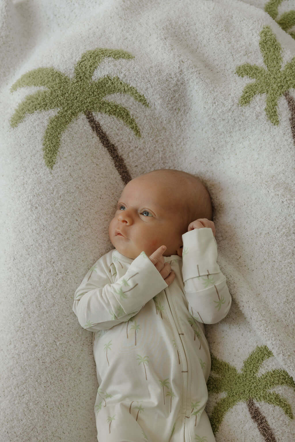 Bamboo Zip Pajamas | Palm | Milk & Baby | Made of the softest premium bamboo. Durable and well designed your little ones can sleep and play in these cozy pajamas. Our smallest sizes have rollover cuffs on the hands and all of the one piece sizes have cuff