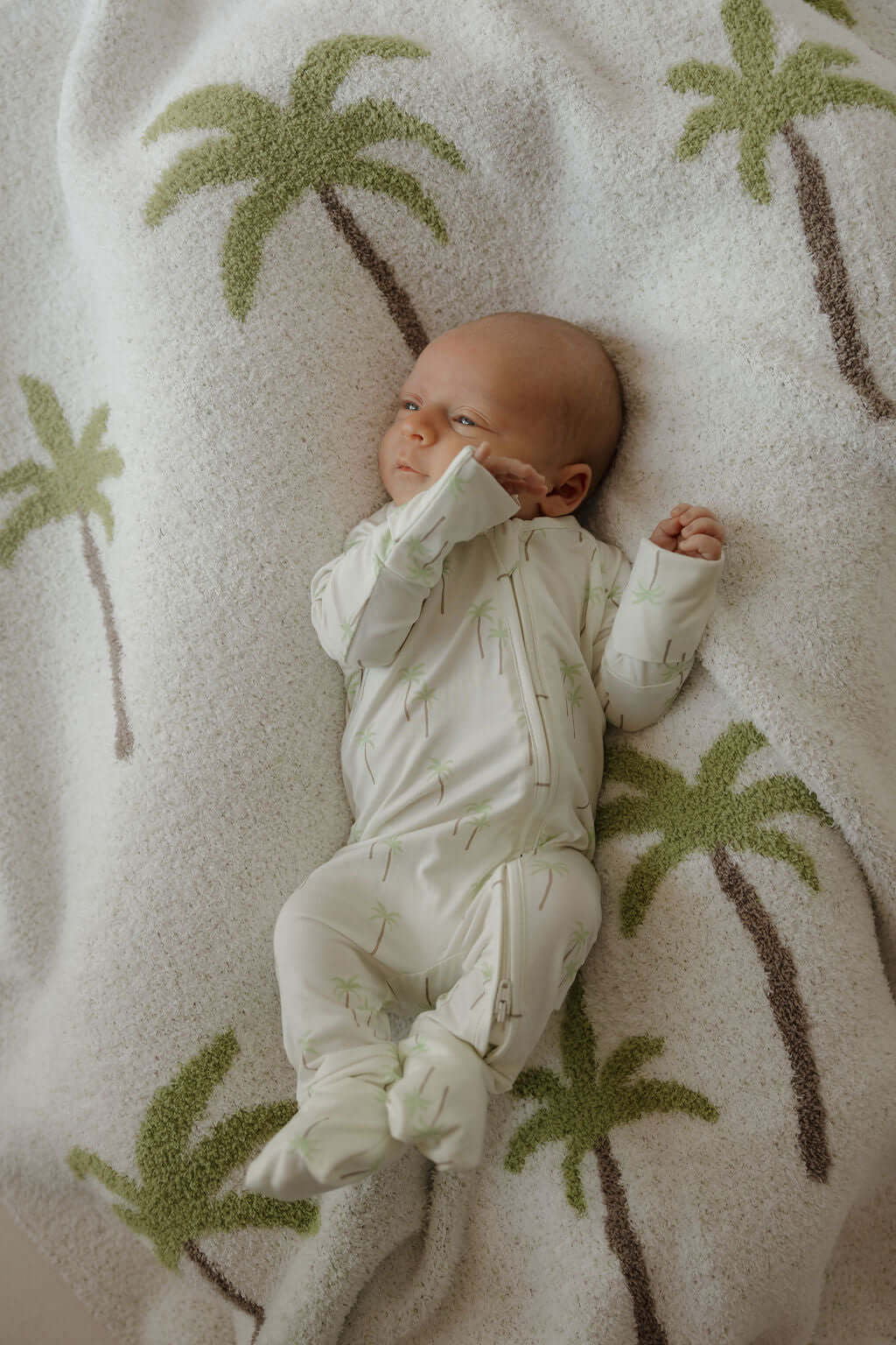 Bamboo Zip Pajamas | Palm | Milk & Baby | Made of the softest premium bamboo. Durable and well designed your little ones can sleep and play in these cozy pajamas. Our smallest sizes have rollover cuffs on the hands and all of the one piece sizes have cuff