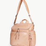 Caraa Baby Bag in blush nylon showcasing multiple compartments for baby essentials and stylish design.