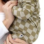 Sage Check | Zip Romper on a baby, featuring soft bamboo blend and fold over cuffs for comfort and style.