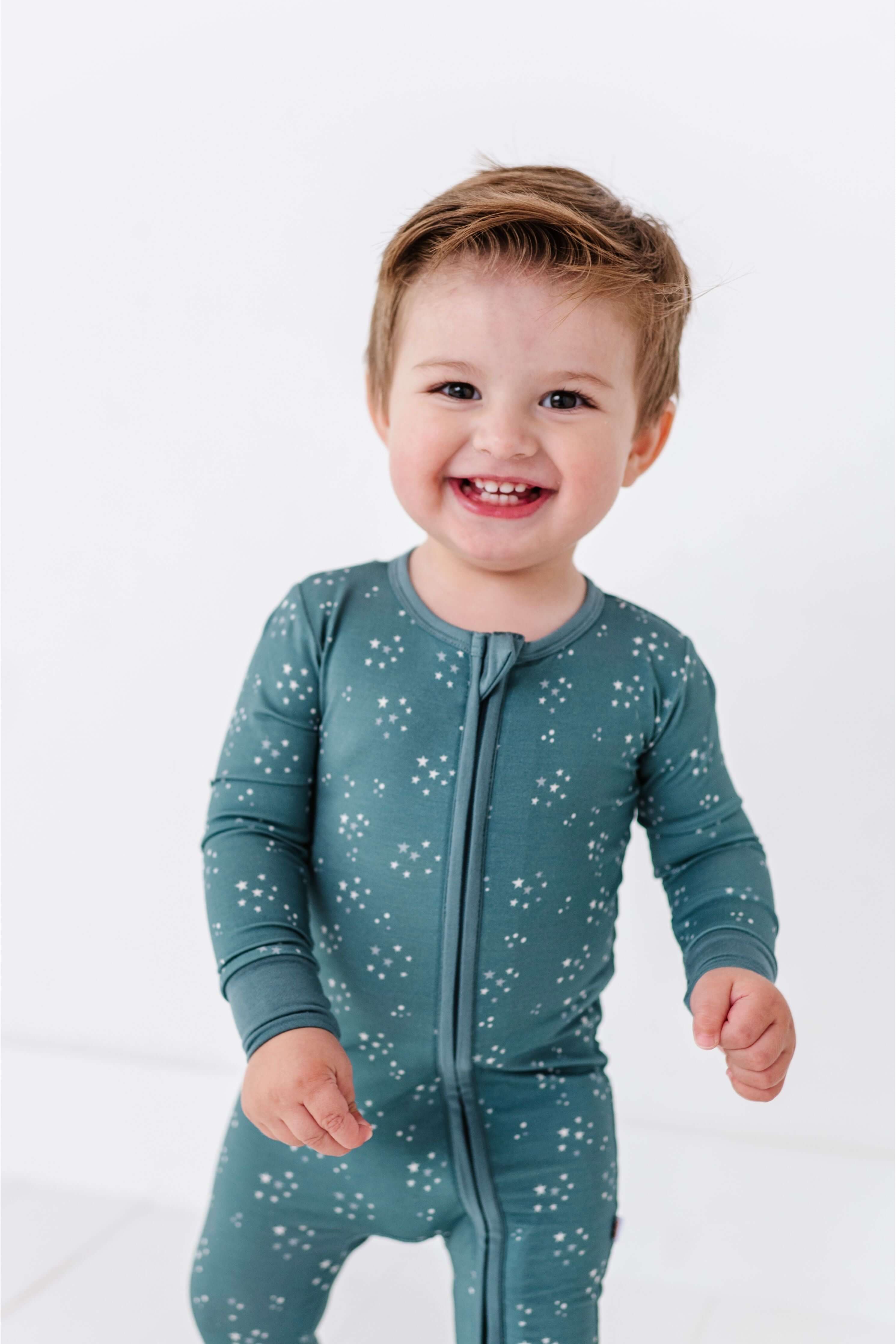Starlit Sky | Bamboo One Piece Zip Pajama | An ultra-soft bamboo zip romper with an adorable star print, designed for comfort, breathability, and effortless diaper changes. Key Features: 🌱 Made from premium bamboo fabric – naturally soft and breathable �