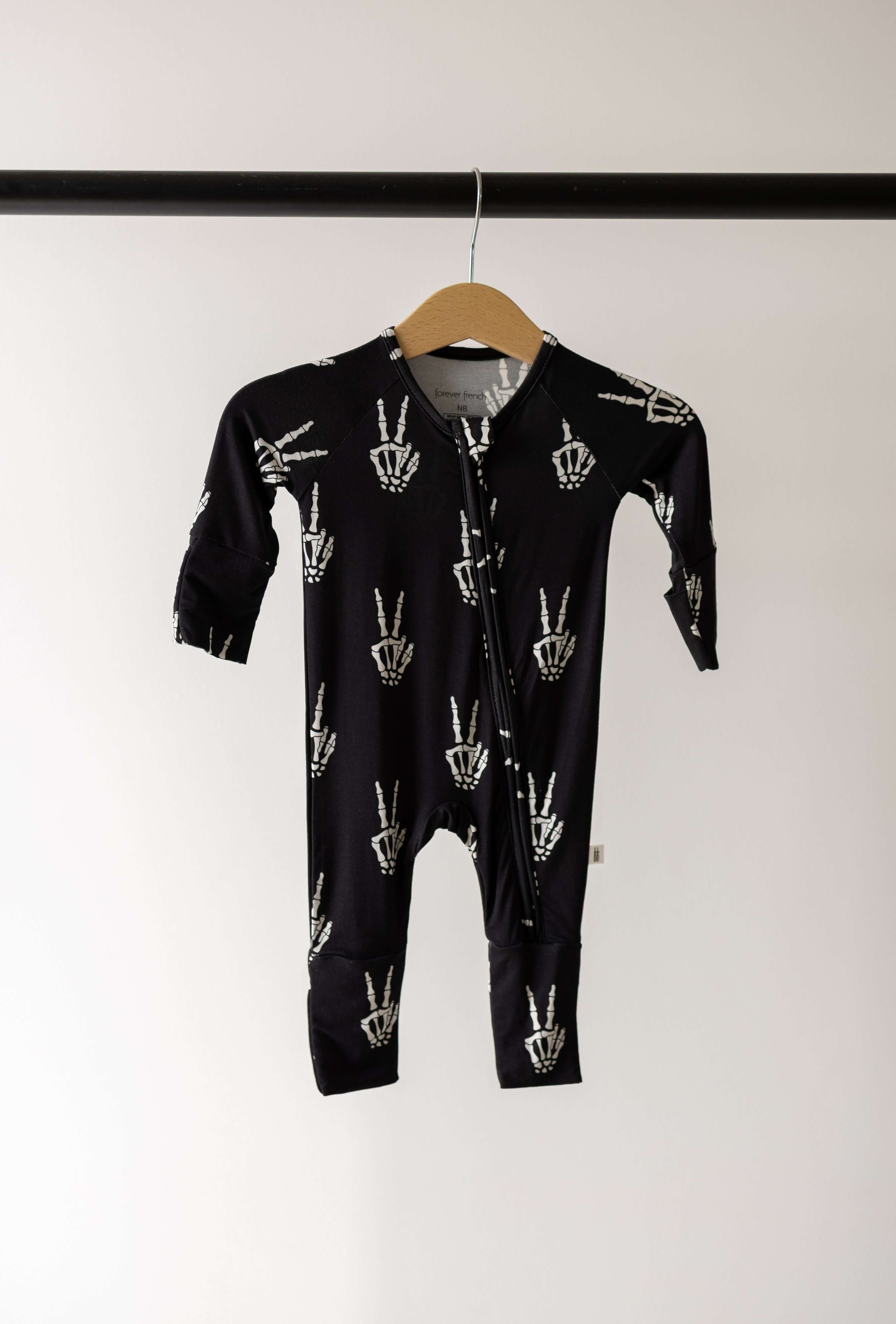 Midnight Skelly | Bamboo Zip Pajamas | Snuggle up in our Bamboo Zip Pajamas, crafted from premium bamboo for ultimate comfort. Perfect for cozy sleep and playful adventures! | Milk & Baby