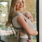 Desert Lark | Aerial Newborn Buckle Wrap | Meet the Aerial Newborn Buckle Wrap: the perfect blend of wrap-like coziness and buckle carrier convenience for your newborn babe. Crafted from our signature CloudBlend™ fabric, it's irresistibly soft and feature