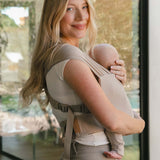 Desert Lark | Aerial Newborn Buckle Wrap | Meet the Aerial Newborn Buckle Wrap: the perfect blend of wrap-like coziness and buckle carrier convenience for your newborn babe. Crafted from our signature CloudBlend™ fabric, it's irresistibly soft and feature