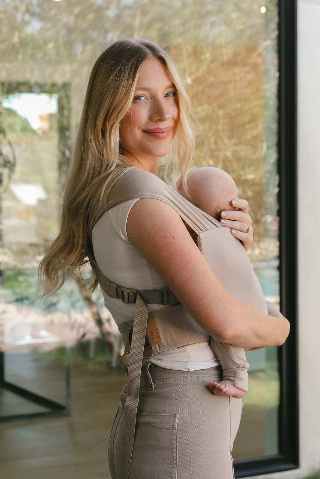 Desert Lark | Aerial Newborn Buckle Wrap | Meet the Aerial Newborn Buckle Wrap: the perfect blend of wrap-like coziness and buckle carrier convenience for your newborn babe. Crafted from our signature CloudBlend™ fabric, it's irresistibly soft and feature