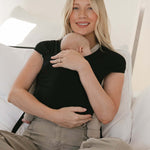 Raven | Aerial Newborn Buckle Wrap | Meet the Aerial Newborn Buckle Wrap: the perfect blend of wrap-like coziness and buckle carrier convenience for your newborn babe. Crafted from our signature CloudBlend™ fabric, it's irresistibly soft and features a pa