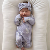 Enchanted Skelly | Bamboo Zip Pajamas | Discover Bamboo Zip Pajamas, soft and cozy for play and sleep. Rollover cuffs for flexibility, perfect for little ones! | Milk & Baby