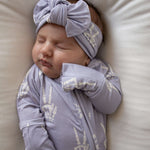Enchanted Skelly | Bamboo Head Wrap | Discover the Bamboo Head Wrap with a stylish bow, perfect for babies and toddlers! Made from silky-soft bamboo material. | Milk & Baby
