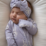 Enchanted Skelly | Bamboo Head Wrap | Discover the Bamboo Head Wrap with a stylish bow, perfect for babies and toddlers! Made from silky-soft bamboo material. | Milk & Baby