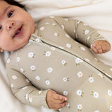 Baby wearing Sage Floral | Zip Romper made of soft bamboo, featuring floral prints and a double zipper for easy diaper changes.