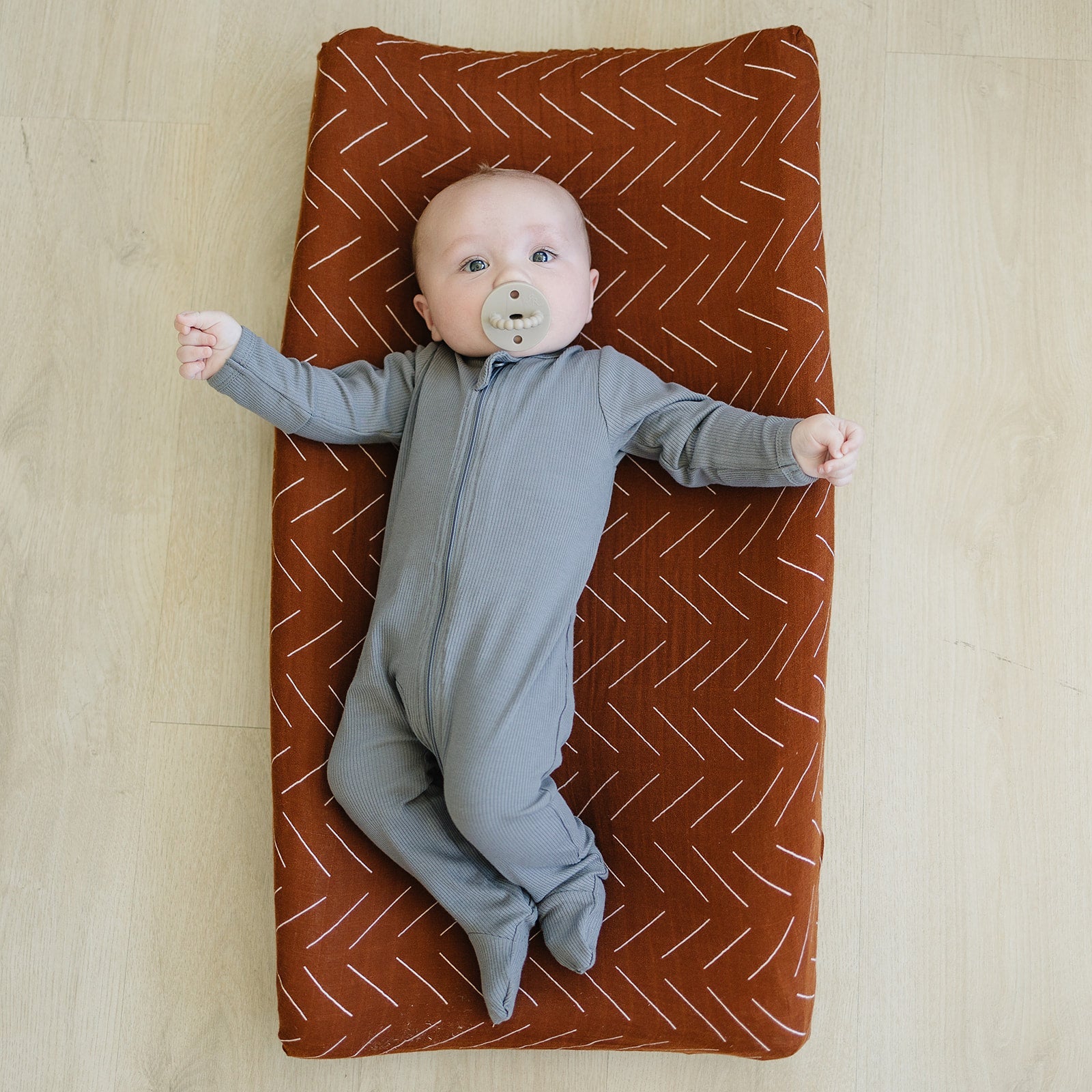 Rust Mudcloth Muslin Changing Pad Cover | Milk & Baby