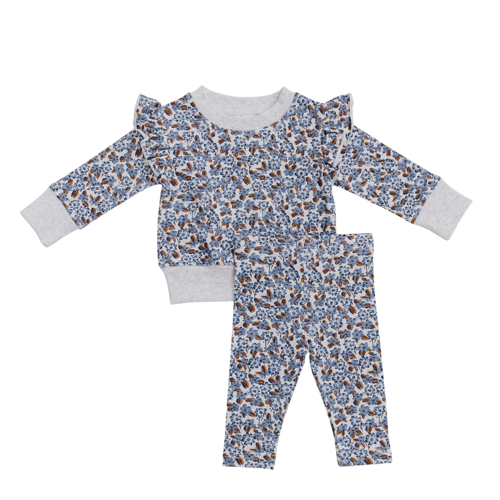 Blue Meadow Ruffle French Terry Set for kids, featuring floral print, soft and breathable fabric.