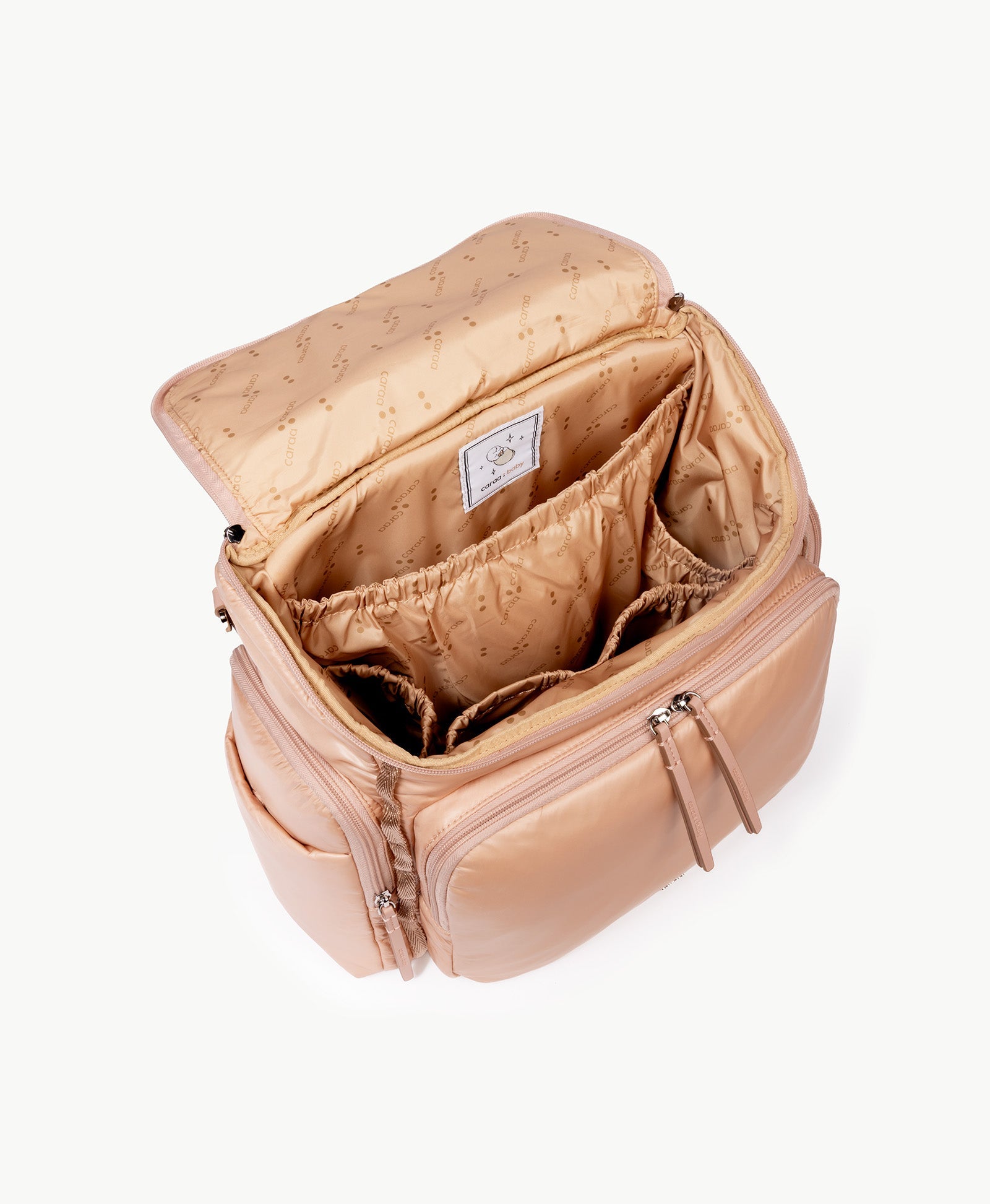 Caraa Baby Bag interior view in blush nylon showing organized compartments for baby essentials.