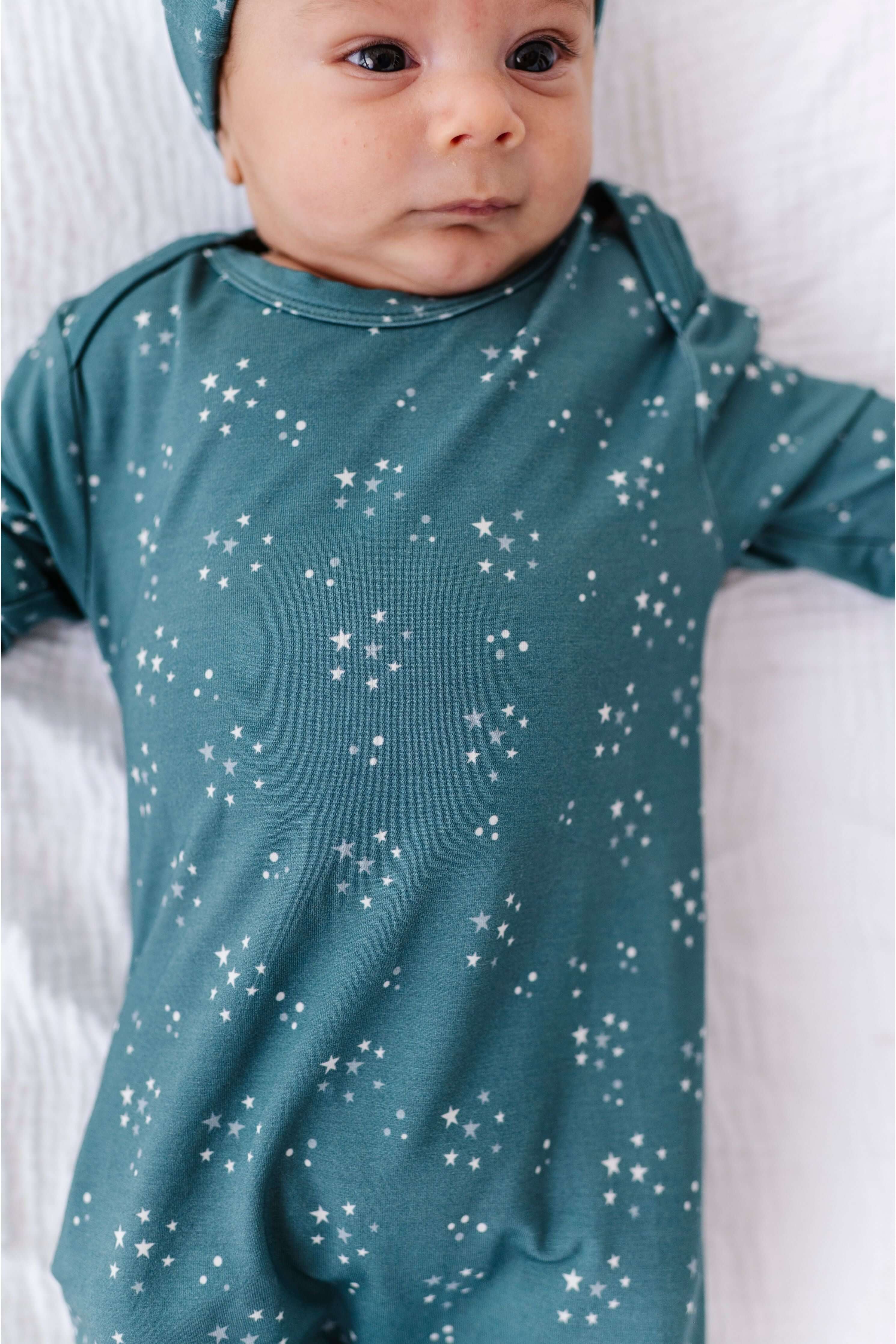 Starlit Sky | Bamboo Knotted Baby Gown | Bird & Beann's bamboo knotted baby gown is crafted from buttery-soft, breathable bamboo viscose and features a charming Starlit Sky print. Designed to keep newborns cozy while simplifying late-night changes, this g