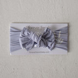 Enchanted Skelly | Bamboo Head Wrap | Discover the Bamboo Head Wrap with a stylish bow, perfect for babies and toddlers! Made from silky-soft bamboo material. | Milk & Baby